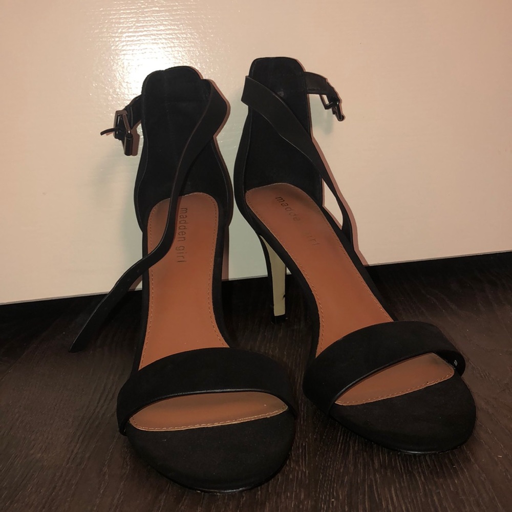 Black madden girl (roughly) four inch heel